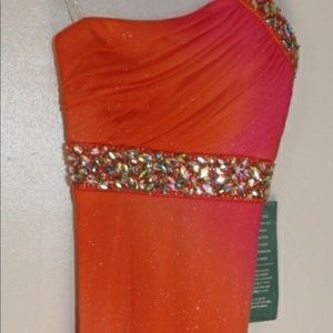 Brand new prom dress by My Michelle. Size 1. BEAUTIFUL